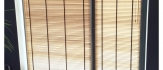 Żaluzje bambusowe 25 mm - elegancja i funkcjonalność w salonie, doskonałe dopasowanie do wnętrza, regulacja światła.
